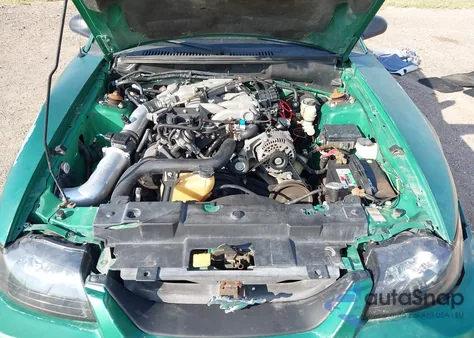 1999 Ford Mustang z USA, uszkodzony, nr VIN 1FAFP4044XF119182